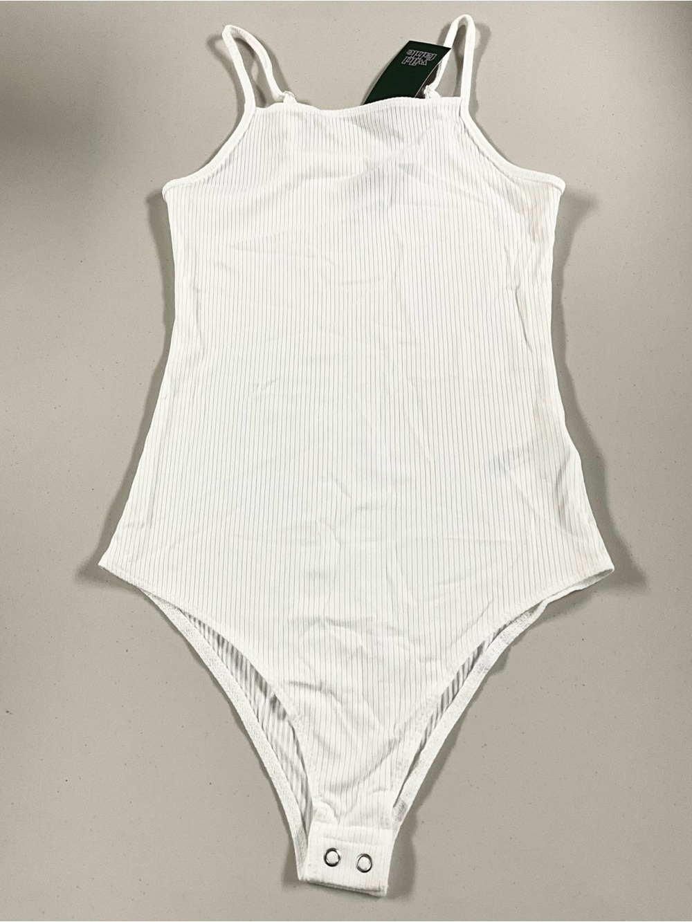 White Ribbed One-Piece Bodysuit